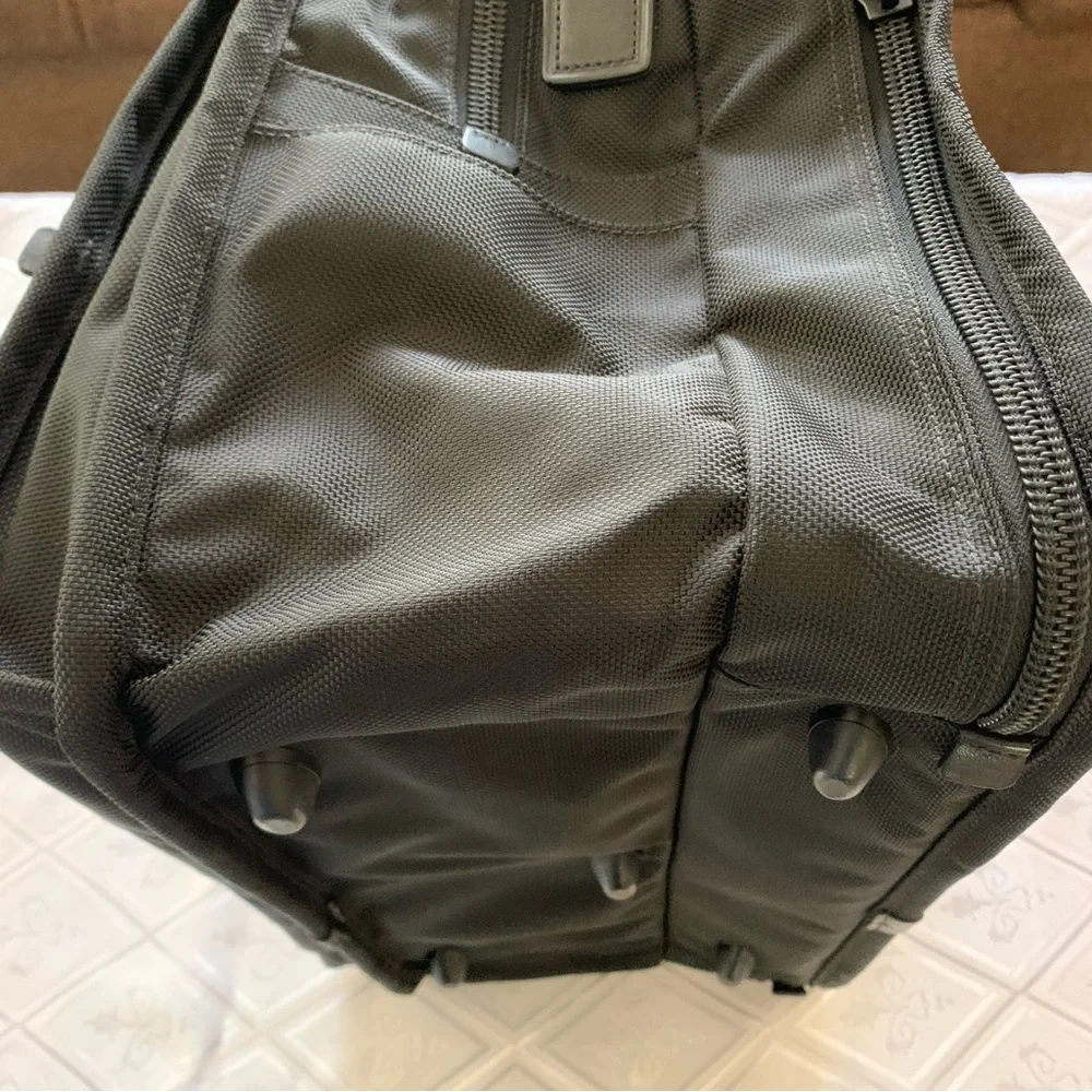 Tumi Black Travel Bag with Adjustable Strap
